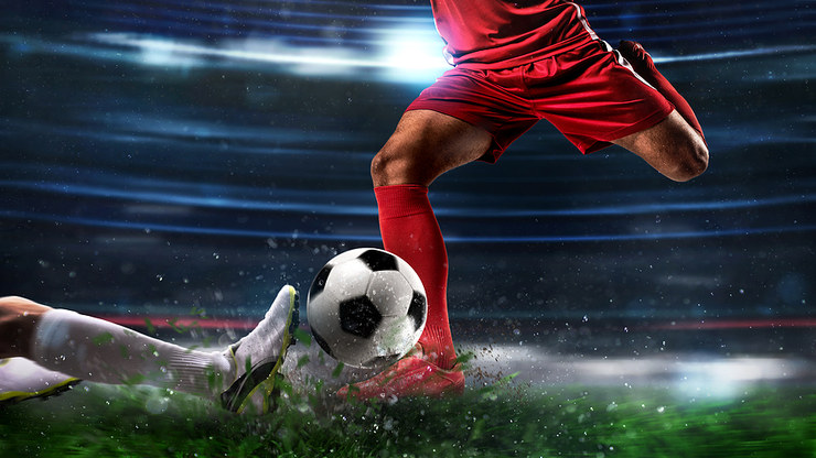 Football Slide Tackle Blurred Stadium