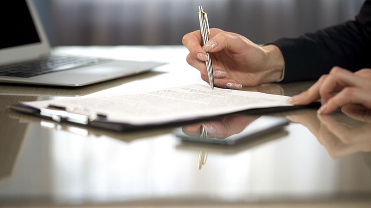 Business Woman Signing Contract