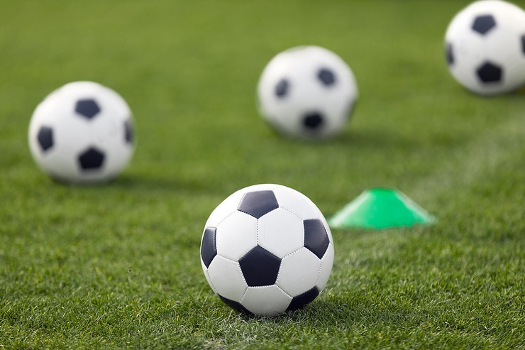 Footballs on Training Pitch