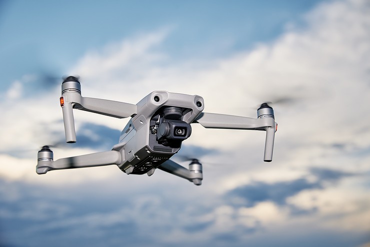Drone Flying Against Cloudy Sky
