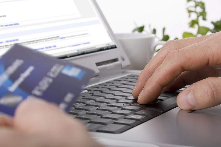 Man Making Online Purchase with Card