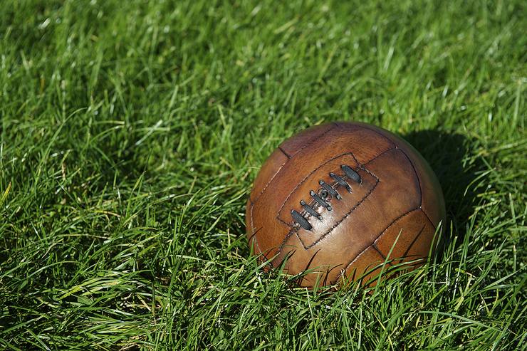 Vintage Football in Long Grass