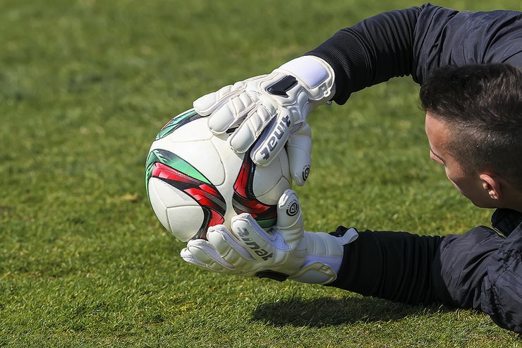 Goalkeeper Saving Ball in Training