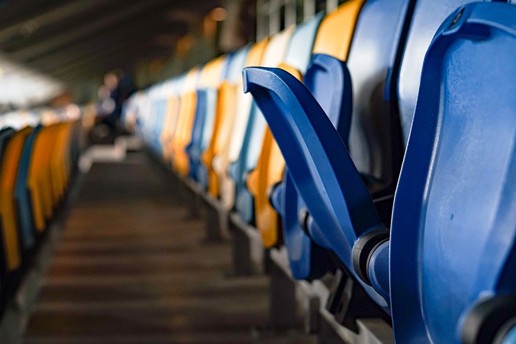 Close Up of Blue and Yellow Stadium Seats