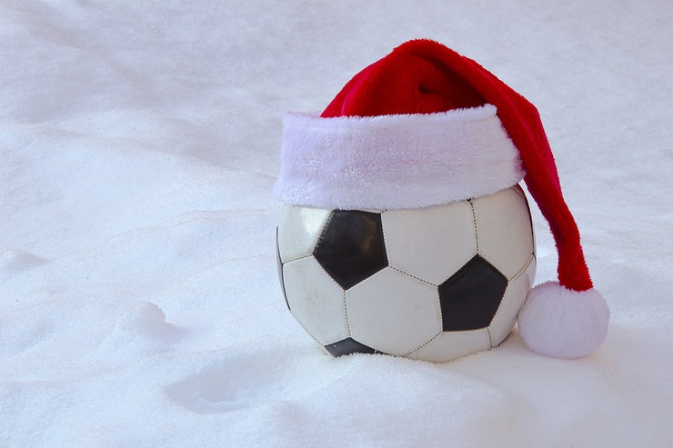 Football in Snow with Santa Hat